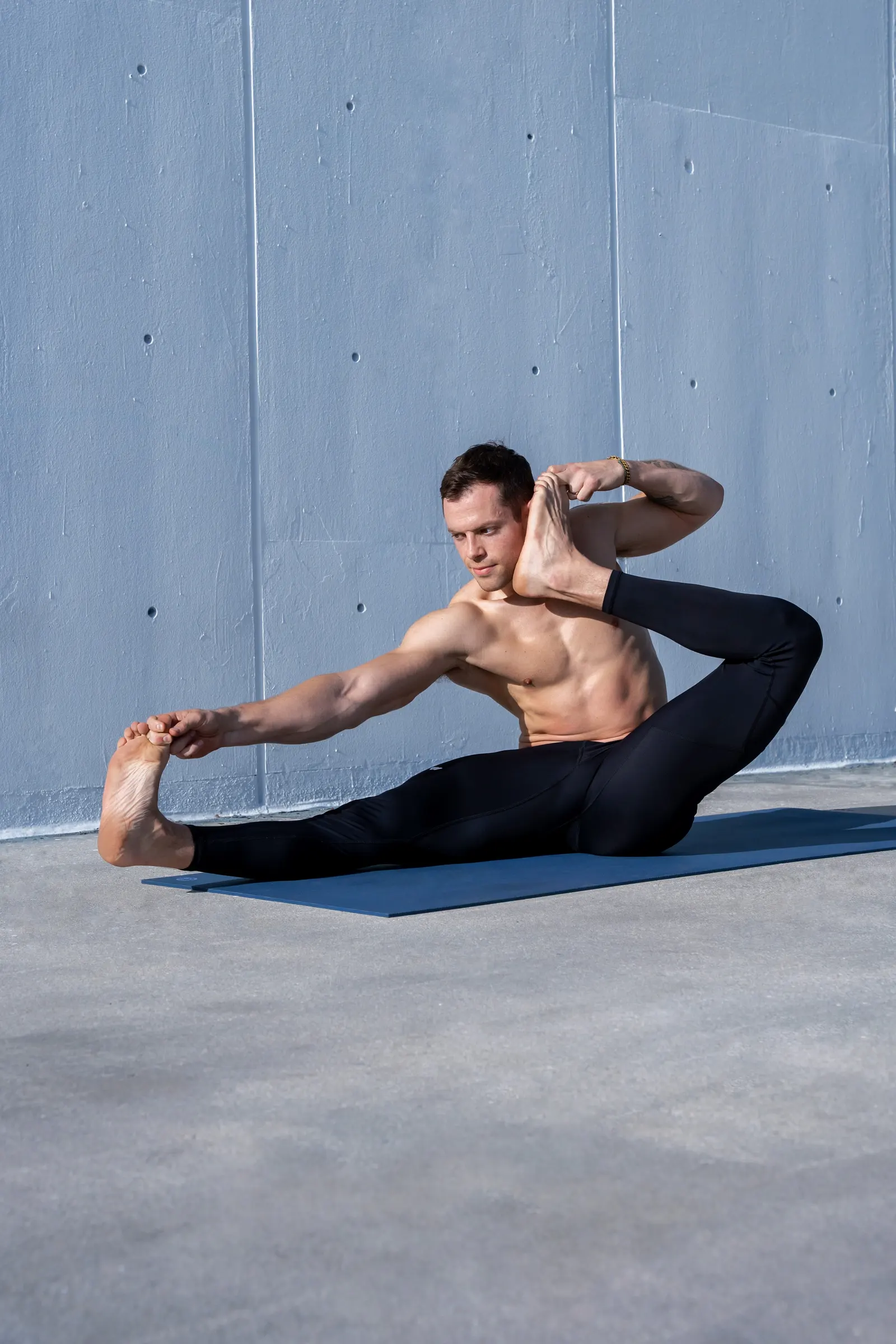 Wade practicing Ashtanga Yoga